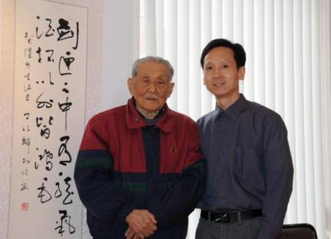 2009年中國禅林畫院紐約首次畫展上，中國禅林畫院院長李智隆與名譽院長丁兆麟先生合影。