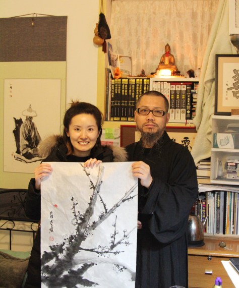 李智隆居士女儿李嘉雯与古一雄居士合影